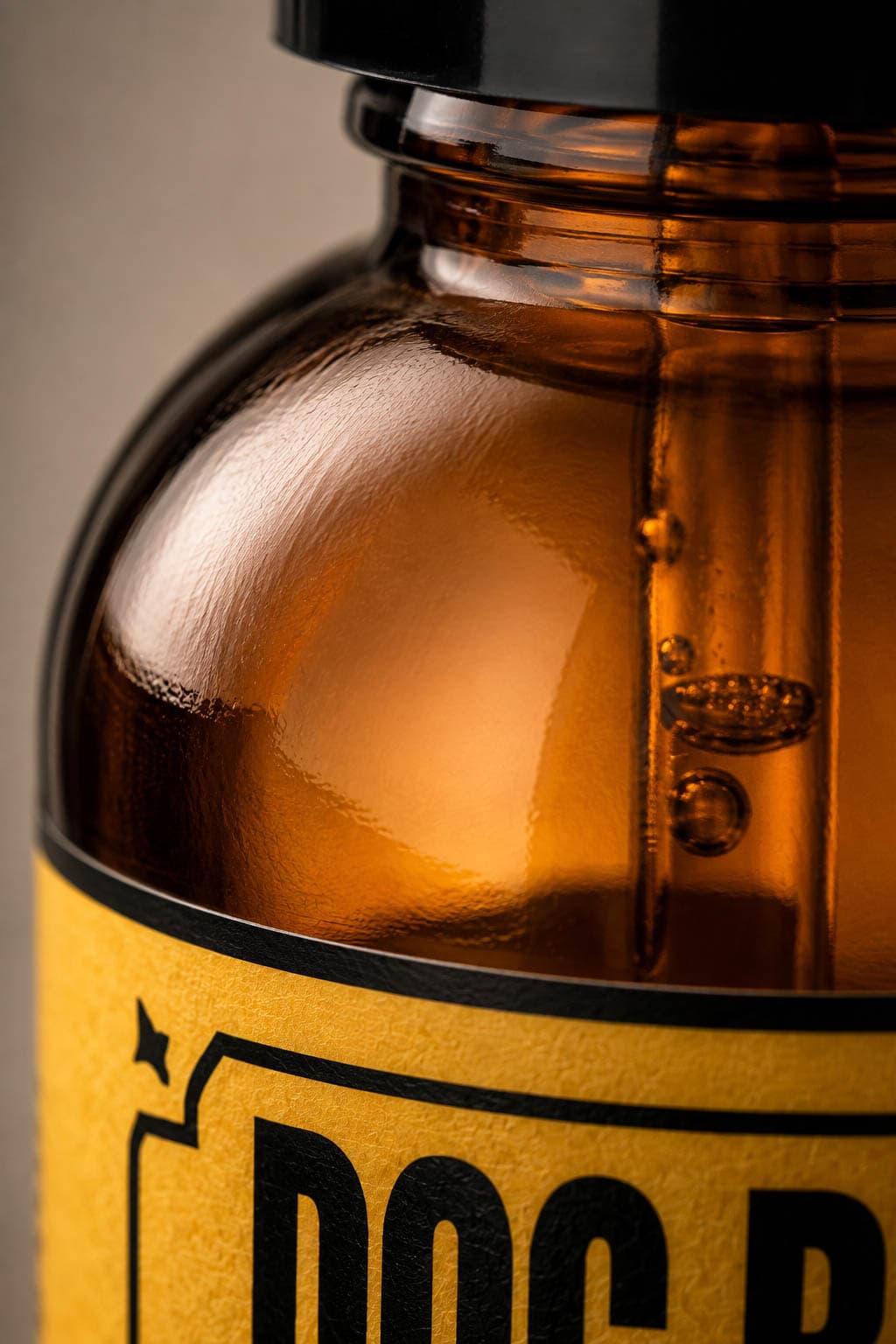The bottle shoulder and label edge, macro