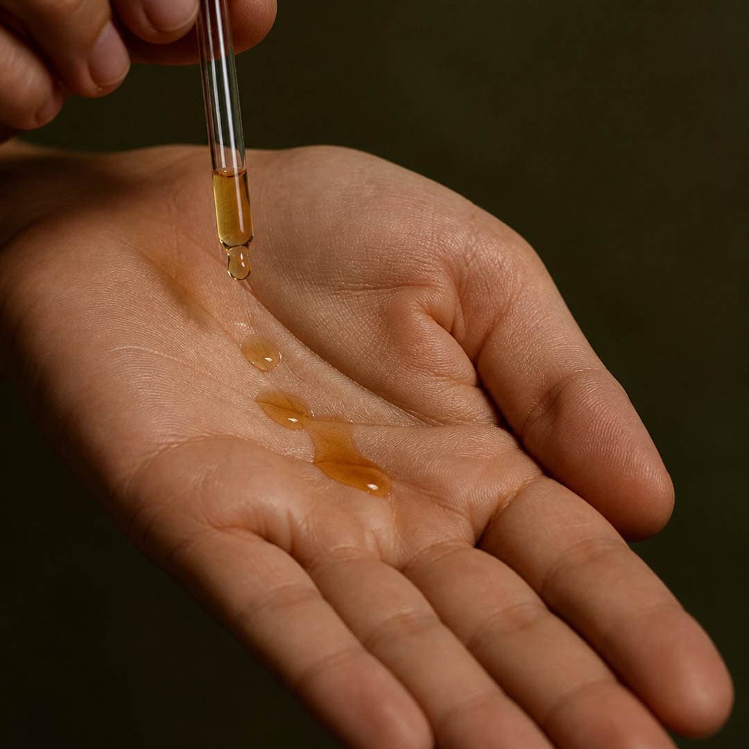 Overhead: drops pooled in an open palm